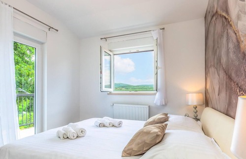 Lovrec House | Enjoy a relaxing time in this comfortable vacation home with pool.