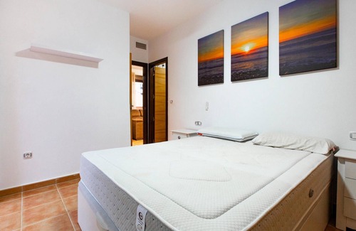 Los Geraeos Apartment | Enjoy a relaxing vacation in this terraced house with communal pool.