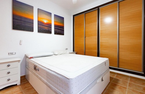 Los Geraeos Apartment | Enjoy a relaxing vacation in this terraced house with communal pool.