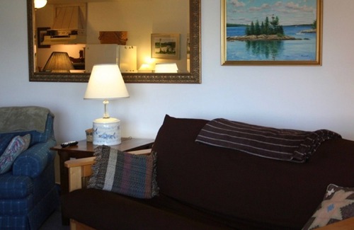 Bar Harbor Apartment | Enjoy A Suite With A Large, Furnished Waterfront Deck Viewing Boats & Islands.