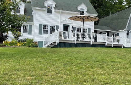 Boothbay Harbor House | Enjoy spectacular views of Lobster Cove. Large yard, EV charger & dog friendly.