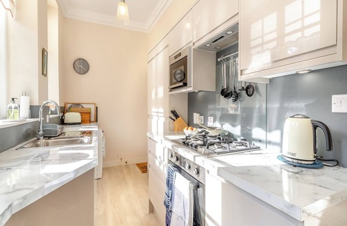 Waterhead Cottage | Enjoy stunning fell views from this grand apartment.