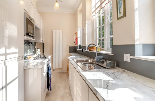 Waterhead Cottage | Enjoy stunning fell views from this grand apartment.