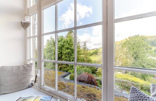 Waterhead Cottage | Enjoy stunning fell views from this grand apartment.