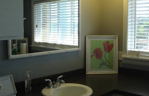 Traverse City Cottage | Enjoy Sunrises & Sunsets from Our 150 Feet of Sandy Beach!