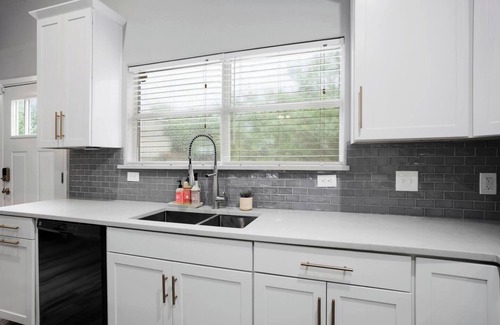 Chestnut House | Enjoy the contemporary luxury in this comfortable 3BR house, ideally situated near the University of Texas and its sporting venues. Visit top restaurants, shops, and other attractions within mins. It features everything you may desire during your vis