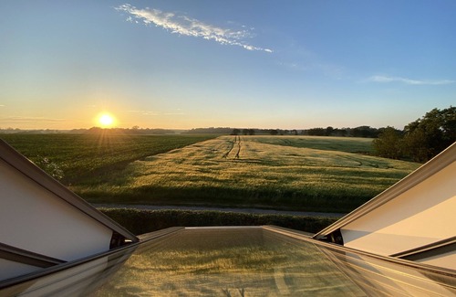 Gudhjem House | Enjoy the sunset above the fields.