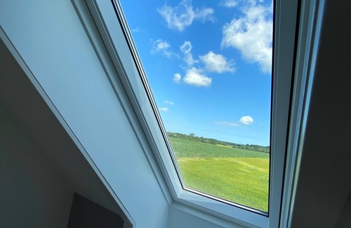 Gudhjem House | Enjoy the sunset above the fields.