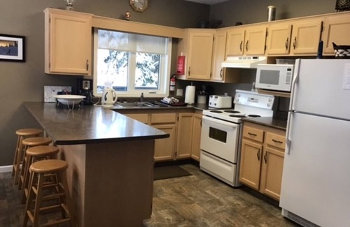 Silver Star Mountain House | Entire Chalet with Private Hot Tub and BBQ. Steps from the village and pond