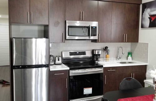 Northwest Calgary Apartment | Entire walkout basement suite idle for long-term stays