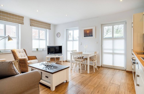 Greetsiel Apartment | Entspannter Urlaub am Hafen: Die Ferienwohnungen 'an't Diekstreek'!
