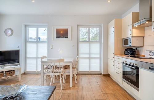 Greetsiel Apartment | Entspannter Urlaub am Hafen: Die Ferienwohnungen 'an't Diekstreek'!