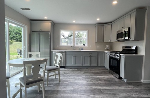 Rapid City House | Equestrian Charm near Torch Lake: Two homes in one!