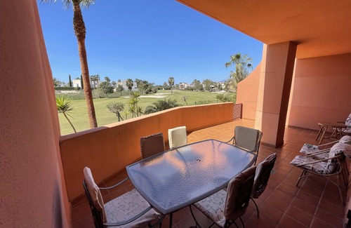 Motril Apartment | Equipado, Terraza de 32 m2 con vistas al campo de golf en Playa Granada.