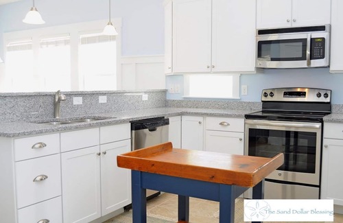 Surf City House | Escape to great views of the ocean & sound in this sun soaked reverse plan home