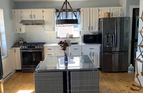 Cap-Pele Ski Chalet | Escape to Seaside Chalet with hot tub at Aboiteau Beach , pet friendly