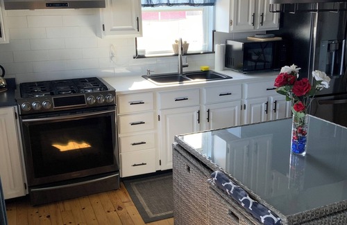 Cap-Pele Ski Chalet | Escape to Seaside Chalet with hot tub at Aboiteau Beach , pet friendly