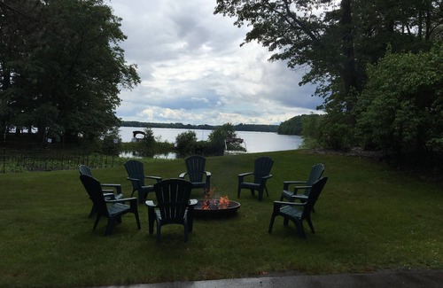 Eagle River House | Escape to the Northwoods at this picturesque Sand Lake home