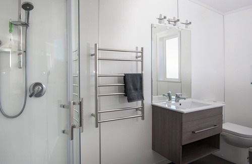 Tasman Cabin | Escape to the tranquil Helme Holiday Bottom Bach, kiwi charm on beautiful Kina Peninsula