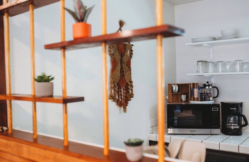 Phoenix House | Escape to this artsy 2-bedroom MCM Guesthouse in charming Phoenix, OR. Unwind in the luxurious spa soaking tub after exploring Southern Oregon. Features high-end design for a stylish, quiet retreat.