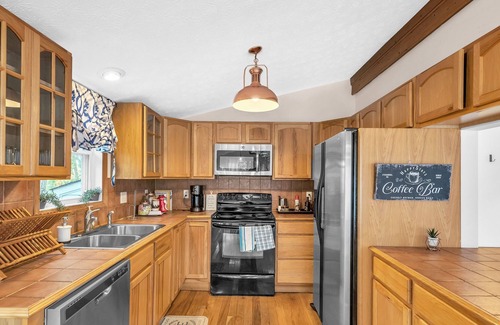 Fishers Hill House | Escape To This River Home with Mountain Views by RedAwning