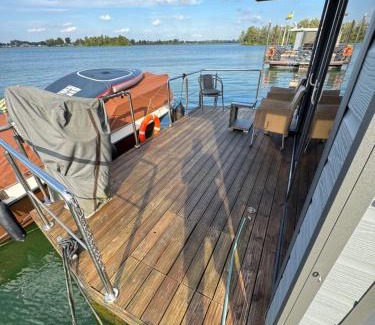 Maasbommel Boat Rental | Exclusive Houseboat La Mare 12 x 5 m in Maasbommel