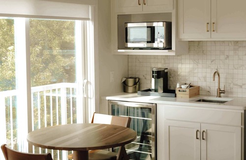 Elk Rapids Apartment | Executive Suite - 1 King | Sleeper Sofa | Balcony