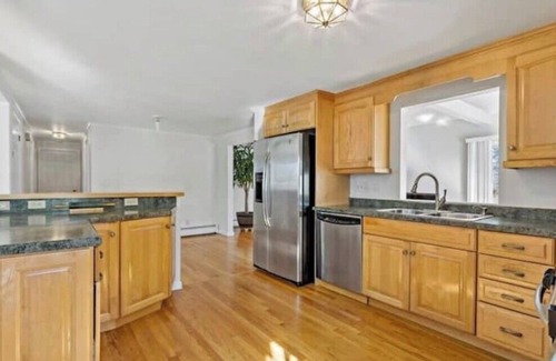 East Haven House | Experience coastal living! This home features water views on every level.