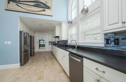 Kill Devil Hills House | Experience luxury at Seas the Day, a stunning 15-bedroom oceanfront retreat in Kill Devil Hills