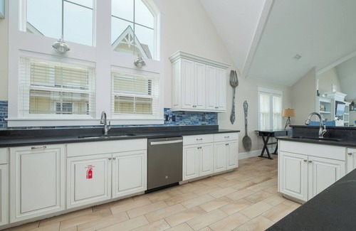 Kill Devil Hills House | Experience luxury at Seas the Day, a stunning 15-bedroom oceanfront retreat in Kill Devil Hills