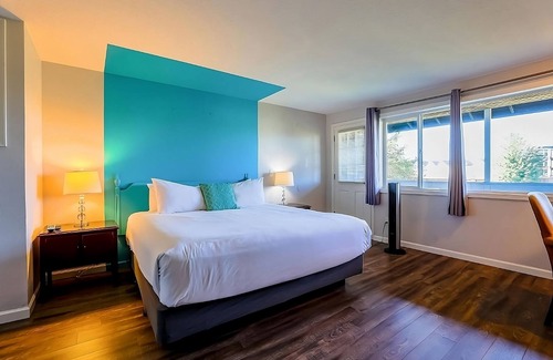 Seaside Hotel | Experience Relaxation in a Whimsical Room by the Riverfront