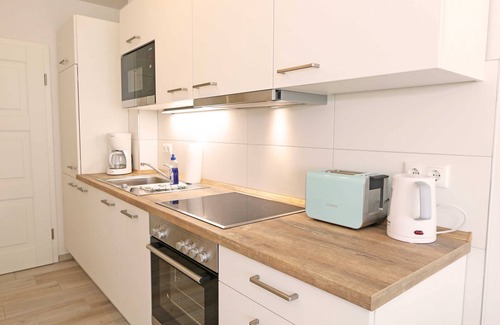 Thiessow Apartment | F: House Windrose Whg 03 Beach oasis with terrace - House Windrose Whg 03