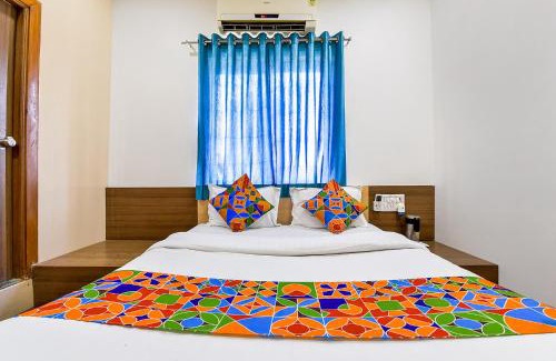 Prahlad Nagar Hotel | FabExpress Relax Inn - Nr Sarkhej - Gandhinagar Highway