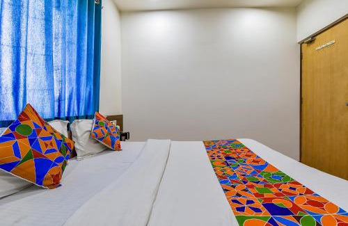 Prahlad Nagar Hotel | FabExpress Relax Inn - Nr Sarkhej - Gandhinagar Highway