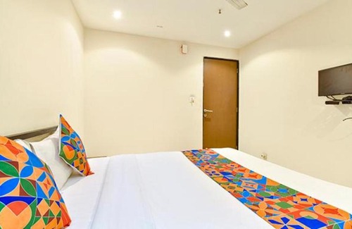 Surat Hotel | FabHotel Happy Rooms