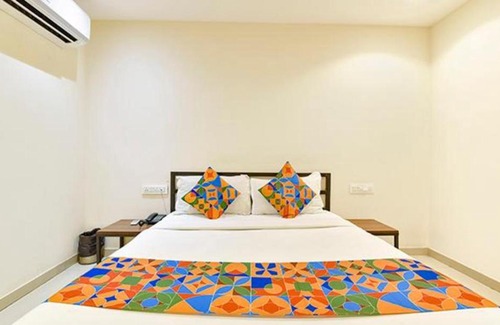 Surat Hotel | FabHotel Happy Rooms