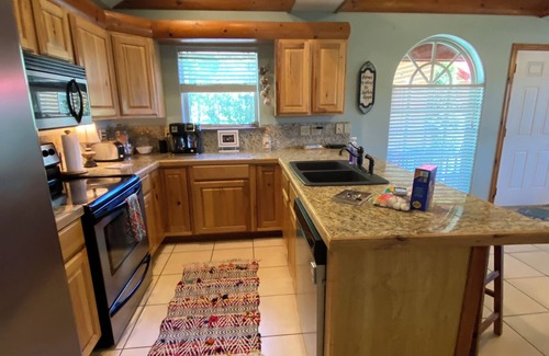 Eucha Cabin | Fall lake days! Popular Grand Lake Dripping Springs cliffside lake view cabin