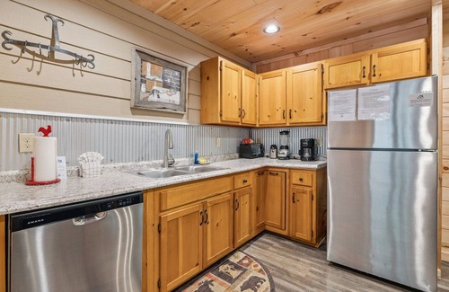 Chalet Village North Cabin | Falling Brook – Cozy Creekside Cabin with Hot Tub, Game Loft & Dog-Friendly Comfort
