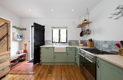 East Preston House | Family and dog friendly beach house with private parking and garden