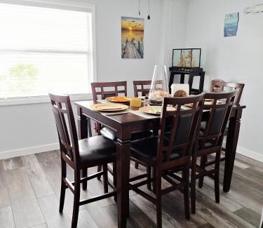 Kenneth City House | Family Friendly 3BR Home Sleeps 6 Private Backyard and Free Parking Near St Pete Beach