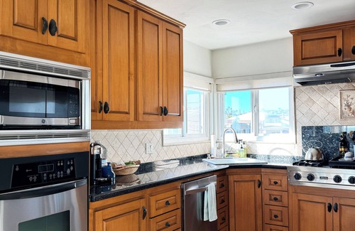 Balboa Peninsula House | Family Friendly Beach Front Property with Large Patio