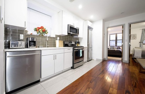 Upper Manhattan Apartment | Family-Friendly Duplex Near Subway | Patio + Games