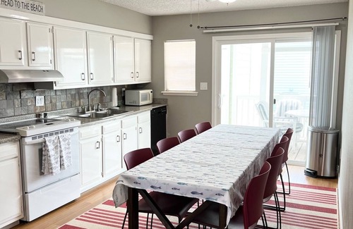 Pirates Beach House | Family Friendly Seaside Home 2 Blocks from Beach Covered Patio