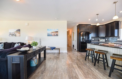 Long Neck House | Family fun - waterfront, beach, pools, pet friendly!