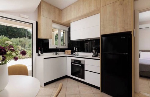 Kassiopi Villa | Family home, 3 min walk to the Gogevina beach and 10 min to Avlaki beach.