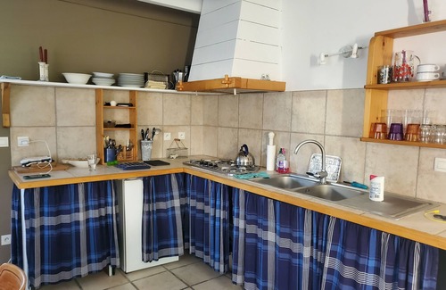 Locmaria House | Family home with wooded garden 1km from the beach sleeps 10