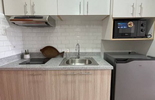 Bacolod Apartment | Family studio centrally located and can fit 4 adults