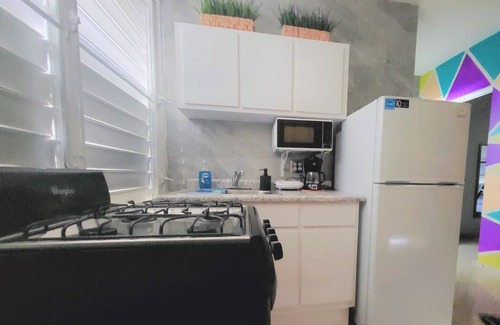 Vega Baja Apartment | Family Villa 2, near to Puerto Nuevo beach, Parking & Wi-Fi