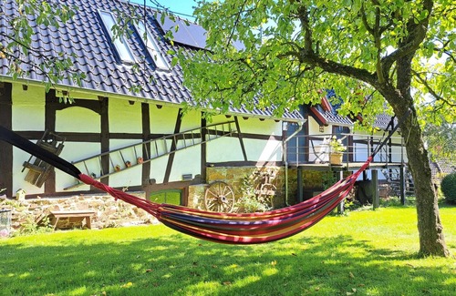Antweiler Apartment | Fantastic Eifel apartment for 3 people with sauna, countryhouse garden & terrace