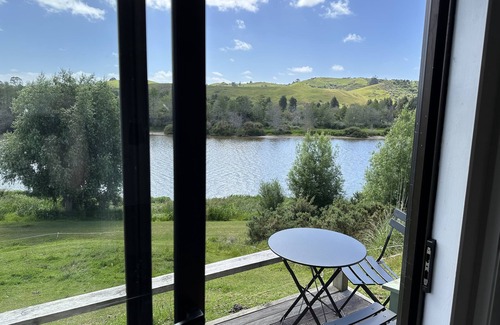 Pukekawa Cabin | Farm Shack with 5-Star River & Sunset Views